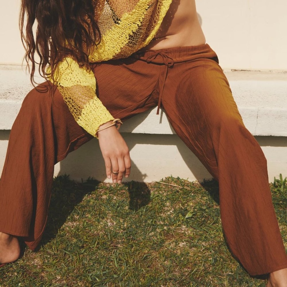 ZARA Mid-rise pants with elastic waistband and adjustable drawstring.